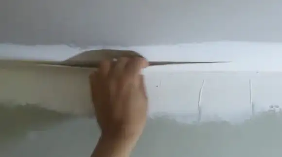 What are Some Common Causes of Drywall Tape Showing Through Paint