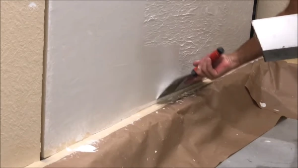 Can You Skim Coat Over Torn Drywall
