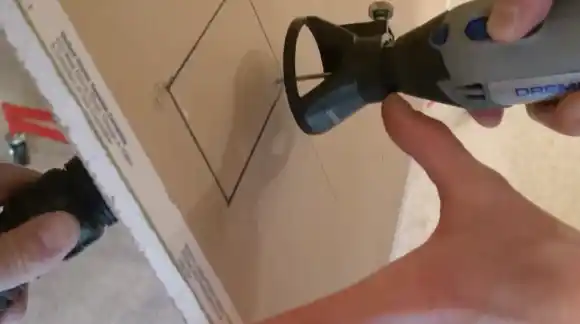 Drywall cutout tool