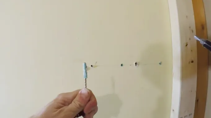 How to Get Screw Out Of Drywall Anchor