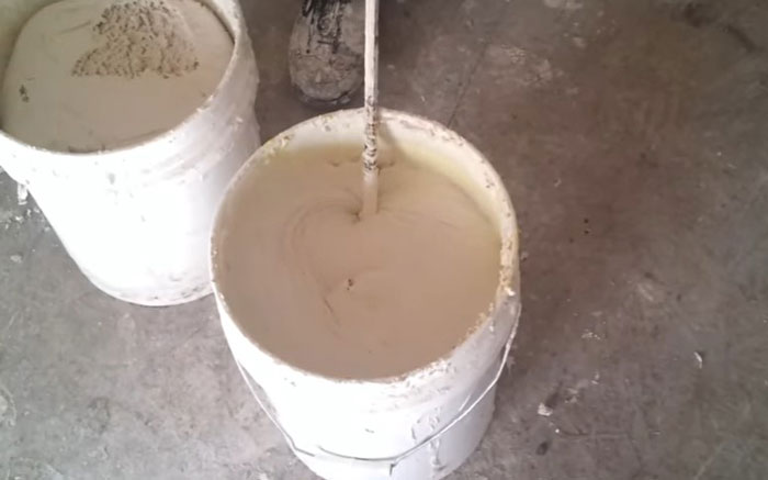 Mixing dish soap and drywall mud for smooth application