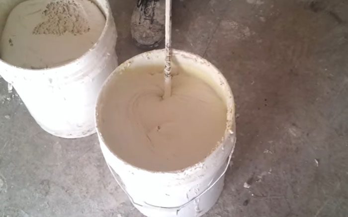 Mixing dish soap and drywall mud for smooth application