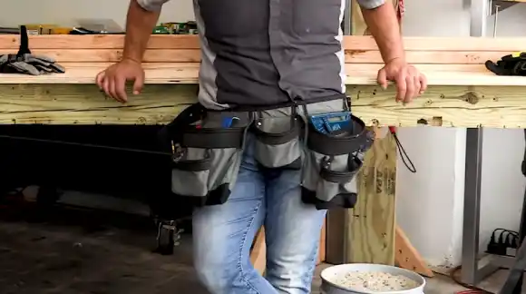 Step-by-Step Instructions for Attaching Suspenders to Tool Belts During Drywall Work